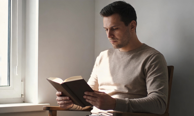 reading the Masters of the Far East books in quiet focused reflection